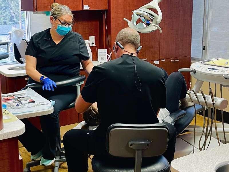 our calgary dentist doing treatment